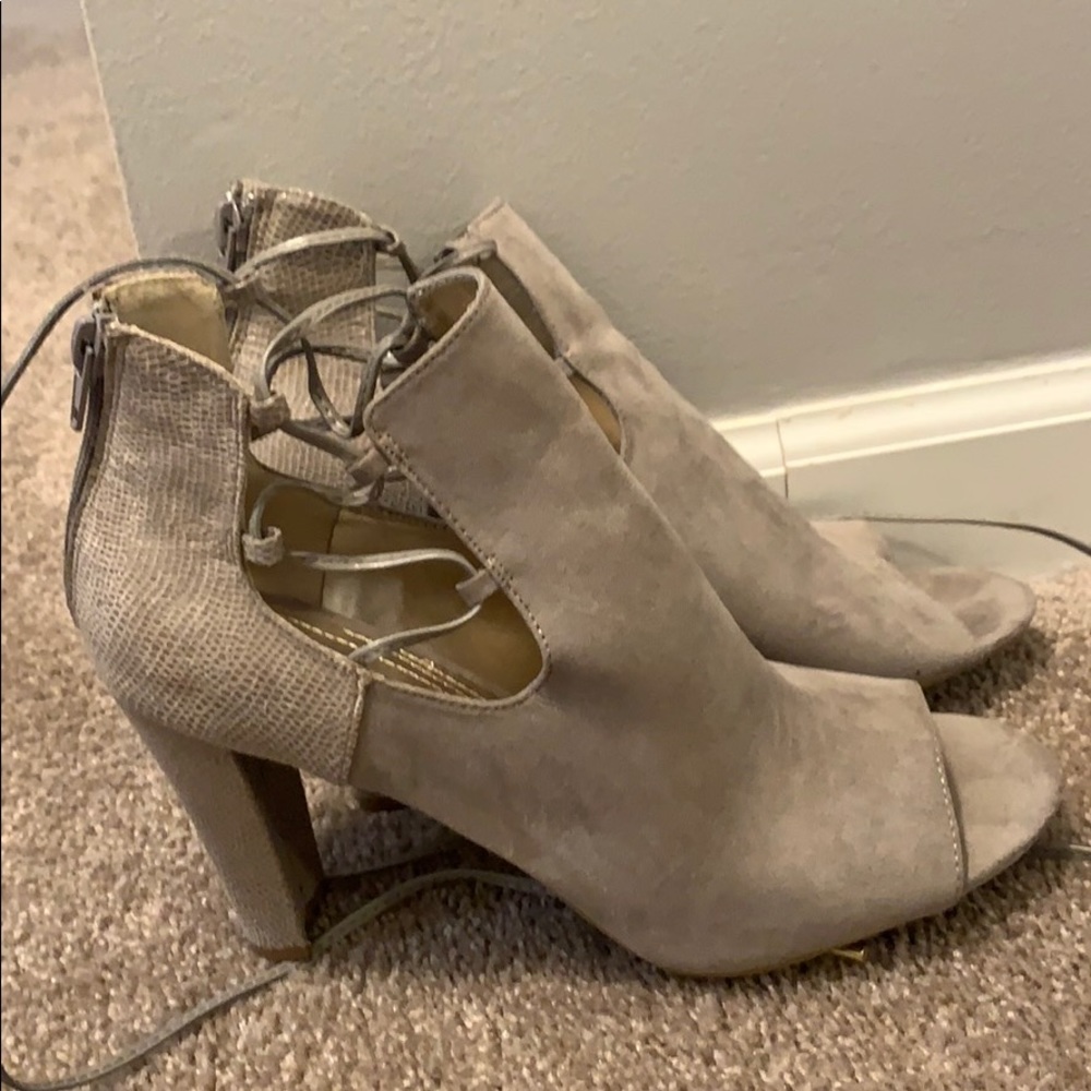 Sugar size 10 lace up heal, never worn outside.